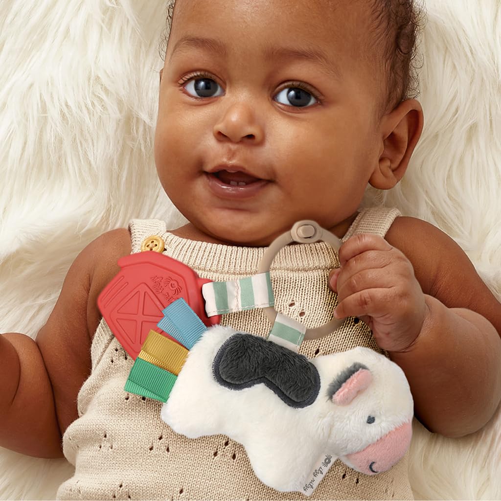 Itzy Ritzy Infant Toy & Teether - Itzy Pal Baby Teething Toy Includes Lovey, Crinkle Sound, Textured Ribbons & Silicone Teether for Newborn (Cow)