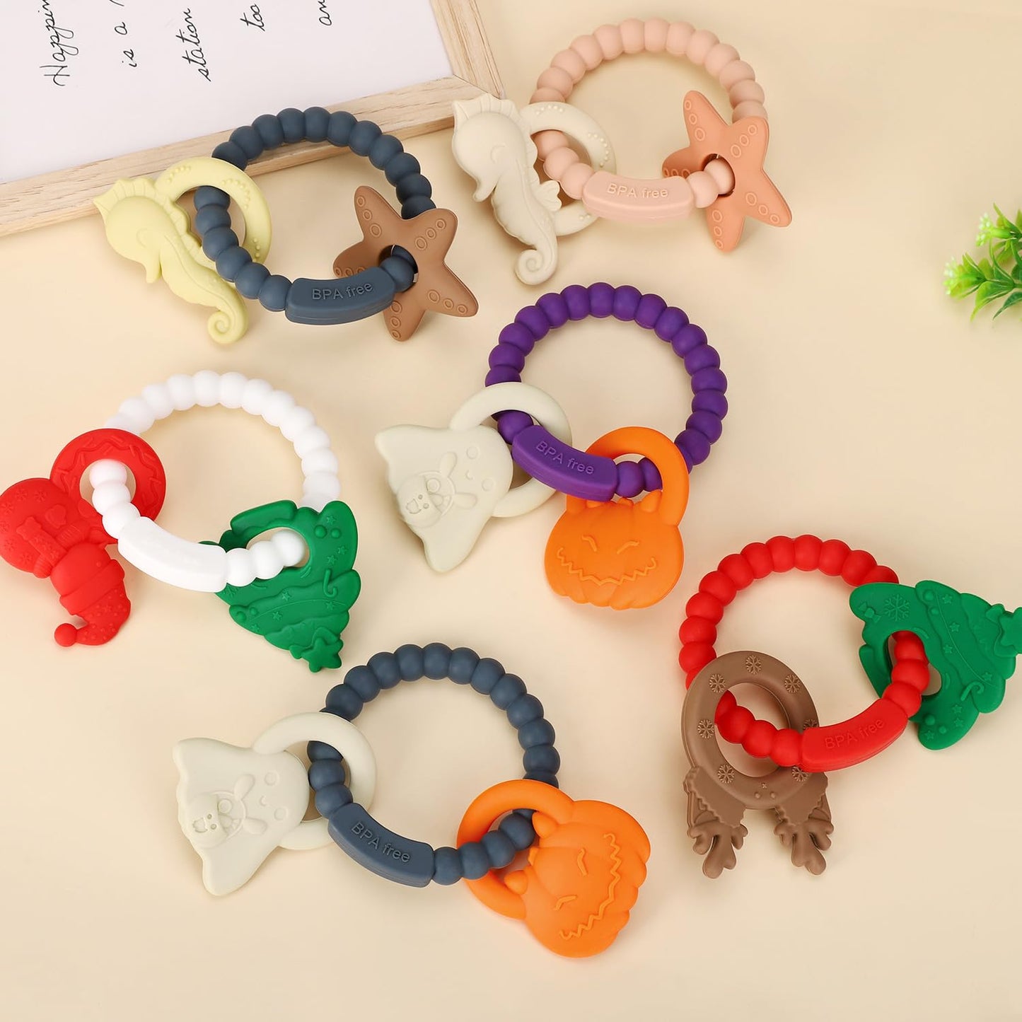 Silicone Teething Ring Toy, Baby Teether Toys with Rattles, BPA Free Sensory Chew Toys for Babies 3-6-12 Months to Soothe Sore Gums, Great Shower, Christmas Gift(Blush)