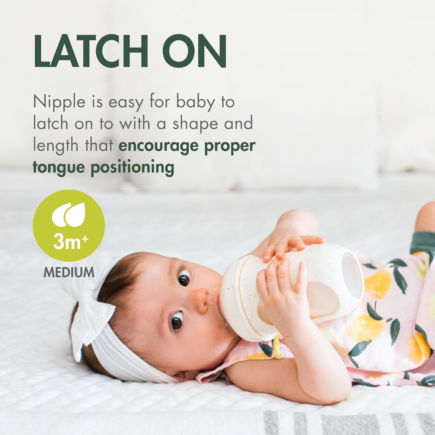 Boon Nursh Bottles - Silicone Baby Bottles Help Ease Colic Symptoms - Formula and Breast Milk Only Touch Platinum Food-Safe Silicone - Medium Flow - Speckle Green - 8 Ounce
