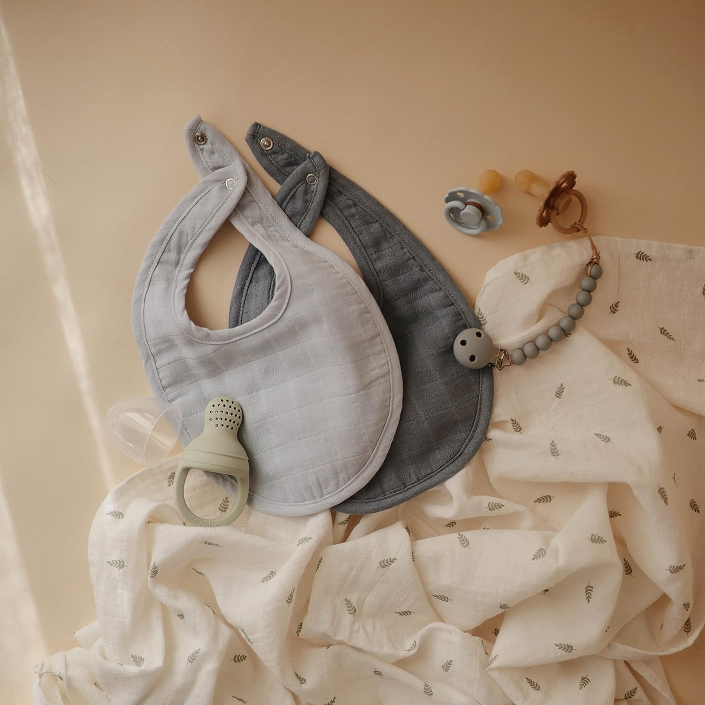 mushie Muslin Baby Bib | Soft Cotton for Infant Drips, Drools & Feedings | Adjustable Fit | 2 Pack