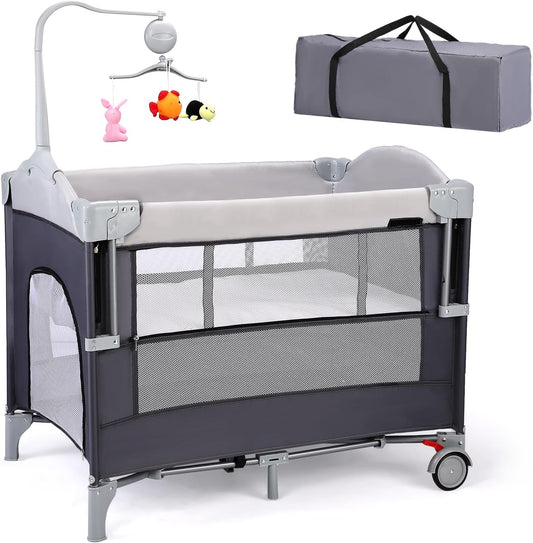 JOYMOR 4 in 1 Pack and Play, Baby Bedside Bassinet, Sturdy Play Yard with Padded Mat and Toy bar with Soft Toys