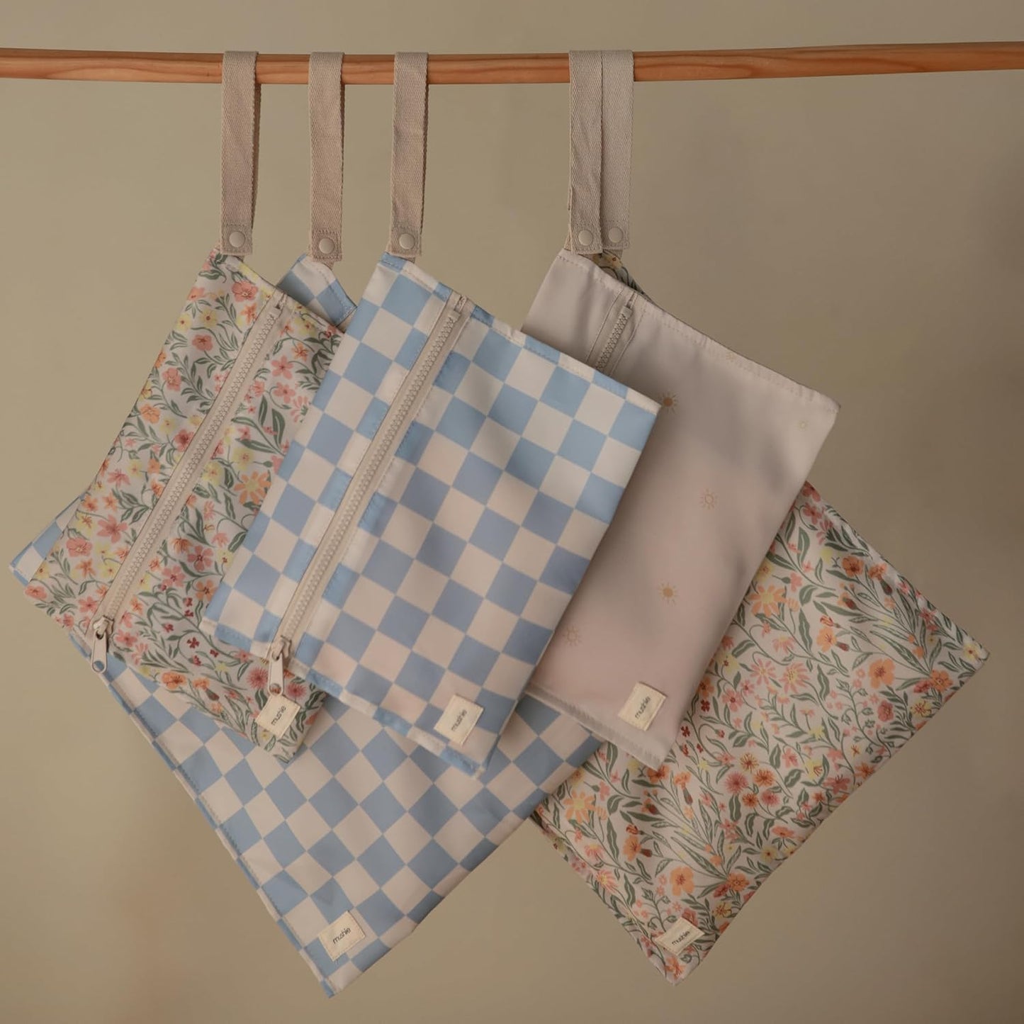 mushie Water Resistant Wet Bags | Large & Small Reusable Storage Bag for Baby Items and Travel | Zippered Pockets with Handle | Machine Washable, Set of 2 (Pastel Blooms)