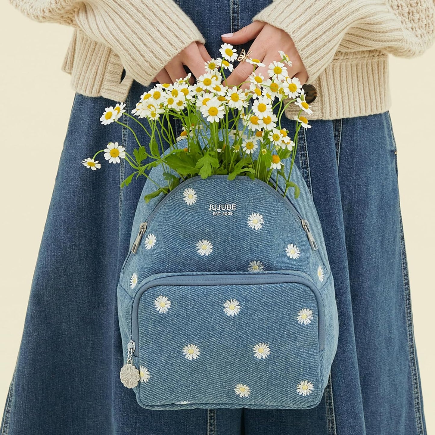 JuJuBe Mini Diaper Bag Backpack, Machine Washable Travel Backpack w/Adjustable Straps & 2 Pockets for Baby Bottles, Diapers, Pacifiers, Snacks, Changing Pad & Daily Essentials, Denim & Daisies (Blue)