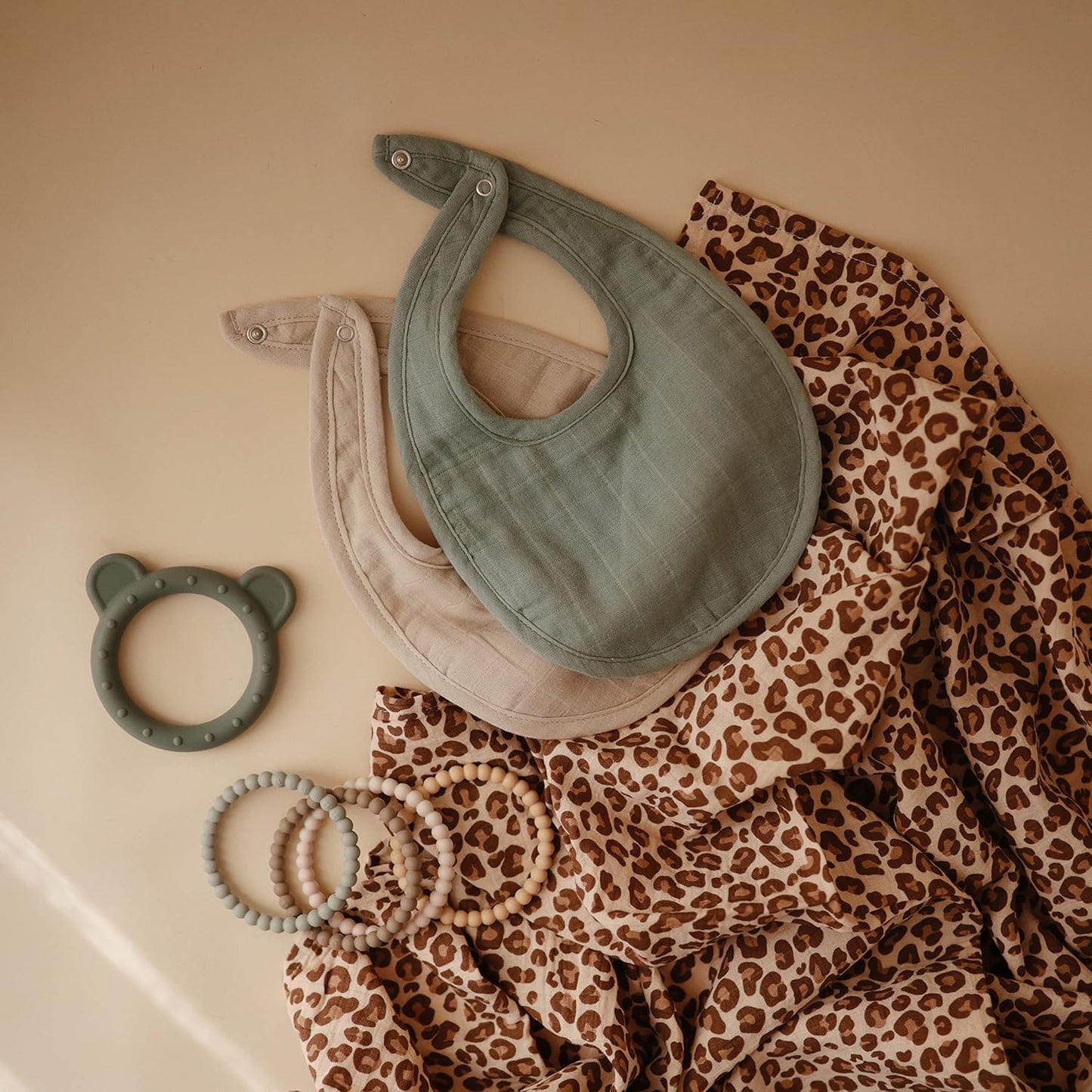 mushie Muslin Baby Bib | Soft Cotton for Infant Drips, Drools & Feedings | Adjustable Fit | 2 Pack